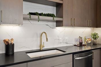 Kitchen with sink and faucet
